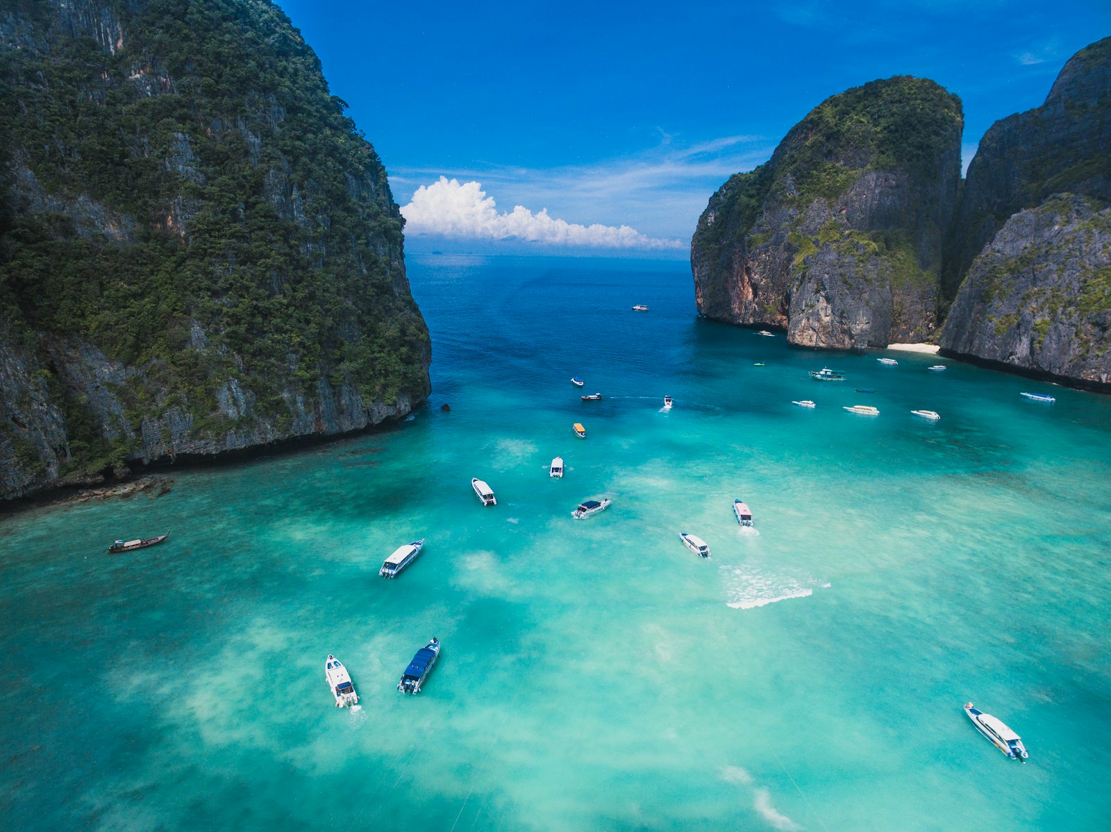 Turquoise bay framed by limestone cliffs